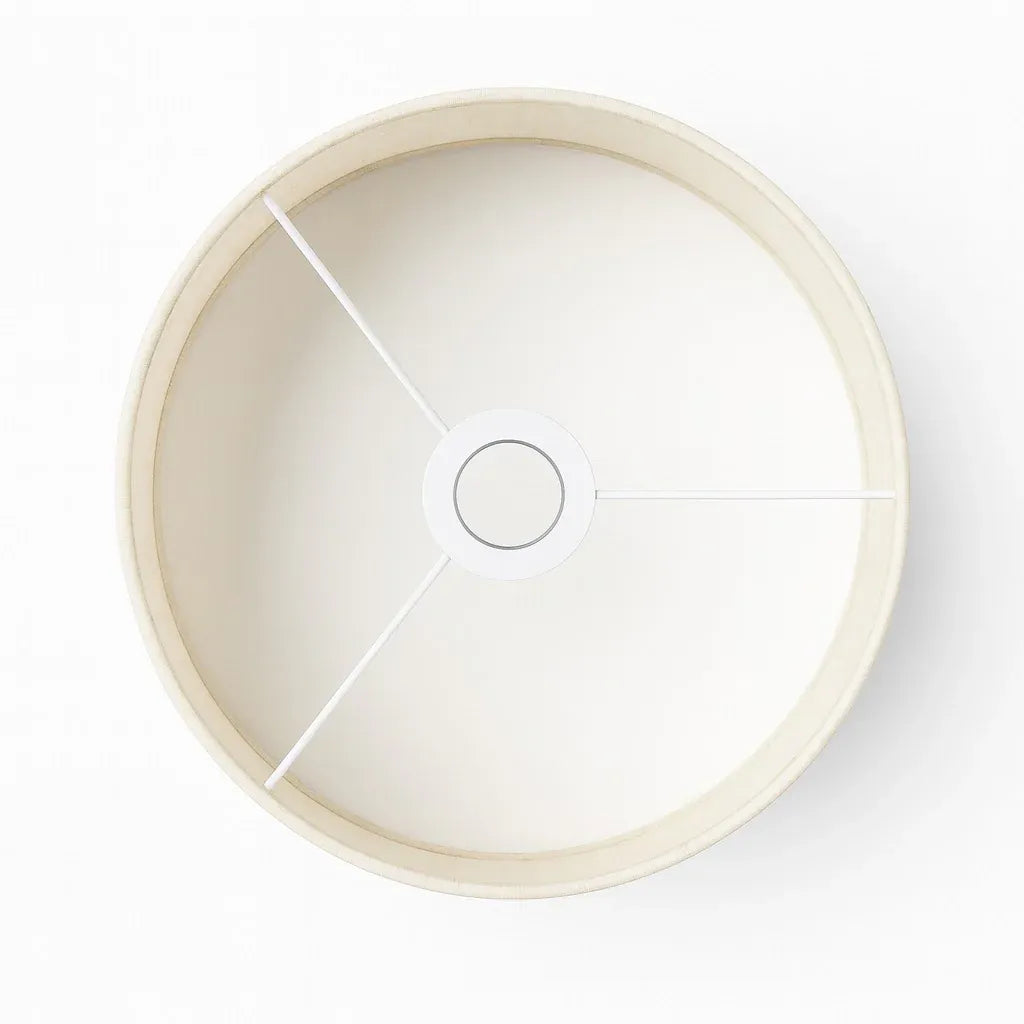 Abat-jour tambour en lin beige naturel vu de dessus, armature intérieure visible, fond blanc